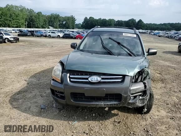 ✅ 2007 Kia Sportage LX • VIN: KNDJF724X77450865 • Lot: 66811595. Wystawiony na Copart z przebiegiem 119 710 mil. Bezpłatny archiwum sprzedaży aukcyjnych z USA i szczegółowy raport historii pojazdu na DreamBid. Zdjęcie 14.