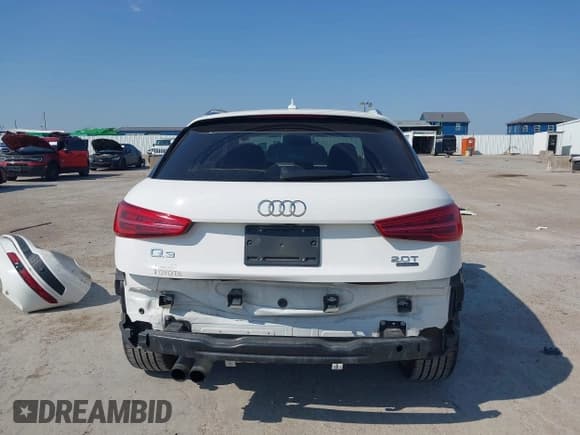 ✅ 2018 Audi Q3 Premium Plus • VIN: WA1JCCFS5JR026980 • Лот: 43168665. Опубликован ранее на IAAI с пробегом 86 255 миль. Бесплатный доступ к архиву аукционных продаж из США и подробный отчёт об истории автомобиля на DreamBid. Изображение 17.
