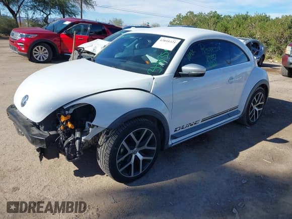 ✅ 2016 Volkswagen Beetle Dune • VIN: 3VWS17AT8GM632868 • Lot: 43810321. Listed on IAAI with 75,311 mi. Free auction sales archive from the USA and detailed vehicle history report at DreamBid. Image 18.