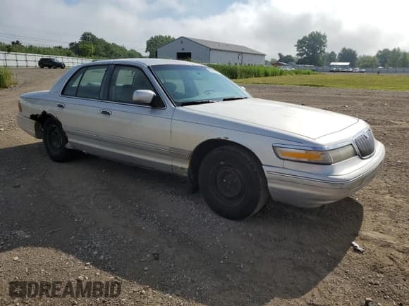 ✅ 1997 Mercury Grand Marquis GS • VIN: 2MELM74WXVX649188 • Lot: 66835365. Listed on Copart with 147,213 mi. Free auction sales archive from the USA and detailed vehicle history report at DreamBid. Image 4.