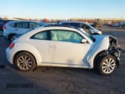✅ 2018 Volkswagen Beetle SE • VIN: 3VWJD7AT7JM711667 • Лот: 43696363. Опубликован ранее на IAAI с пробегом 60 156 миль. Бесплатный доступ к архиву аукционных продаж из США и подробный отчёт об истории автомобиля на DreamBid. Изображение 14.