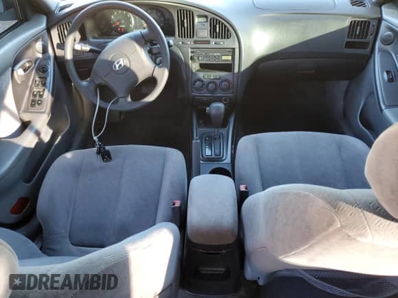 2005 Hyundai Elantra GLS z VIN KMHDN46DX5U041428, wystawiony jako Copart lot #80684274 z przebiegiem 109 025 mil mil oraz Szkoda całkowita • Salvage title. Historia ofert i sprzedaży dostępna na DreamBid. Obrazek 8.