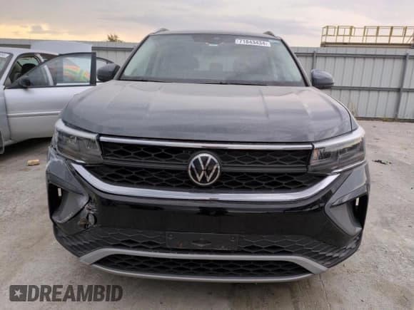 ✅ 2022 Volkswagen Taos SE • VIN: 3VVSX7B28NM022605 • Lot: 71843434. Listed on Copart with 26,473 mi. Free auction sales archive from the USA and detailed vehicle history report at DreamBid. Image 5.