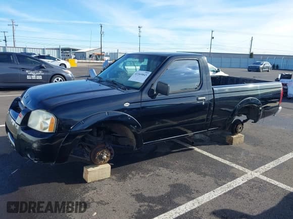 ✅ 2001 Nissan Frontier XE • VIN: 1N6DD21S41C399865 • Lot: 41569843. Listed on IAAI with Not provided. Free auction sales archive from the USA and detailed vehicle history report at DreamBid. Image 18.