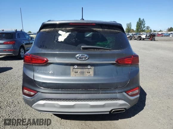 ✅ 2020 Hyundai Santa Fe SE • VIN: 5NMS23AD2LH173450 • Lot: 82089665. Wystawiony na Copart z przebiegiem 86 838 mil. Bezpłatny archiwum sprzedaży aukcyjnych z USA i szczegółowy raport historii pojazdu na DreamBid. Zdjęcie 6.