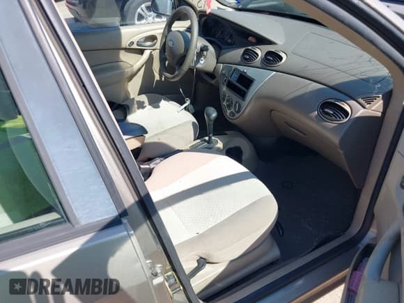 ✅ 2004 Ford Focus ZTS • VIN: 1FAFP38Z34W178603 • Lot: 43144569. Listed on IAAI with 123,758 mi. Free auction sales archive from the USA and detailed vehicle history report at DreamBid. Image 5.