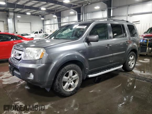 ✅ 2011 Honda Pilot EX-L • VIN: 5FNYF4H75BB051704 • Лот: 92026965. Опубликован ранее на Copart с пробегом 124 117 миль. Бесплатный доступ к архиву аукционных продаж из США и подробный отчёт об истории автомобиля на DreamBid. Изображение 1.