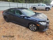 ✅ 2016 Honda Civic LX • VIN: 19XFC2F52GE034524 • Lot: 84631585. Listed on Copart with 124,514 mi. Free auction sales archive from the USA and detailed vehicle history report at DreamBid. Image 4.