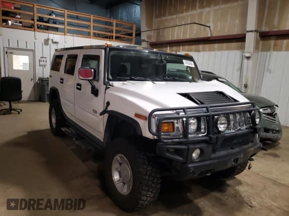 ✅ 2004 Hummer H2 • VIN: 5GRGN23U84H115333 • Lot: 74353434. Listed on Copart with Not provided. Free auction sales archive from the USA and detailed vehicle history report at DreamBid. Image 4.