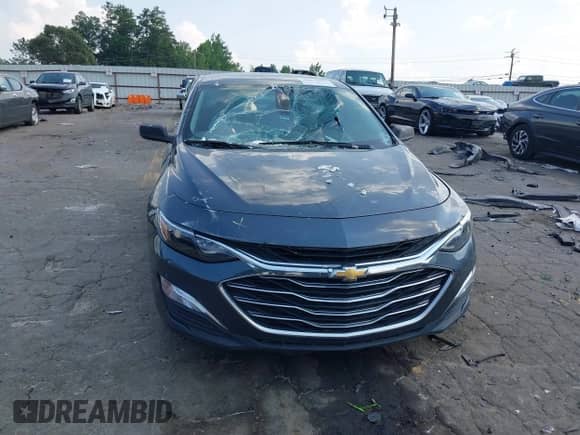 2019 Chevrolet Malibu LS with VIN 1G1ZB5STXKF184023, listed as a IAAI auction lot 42578554 with 107,729 mi miles and . Bid and sale history available at DreamBid. Image 13.