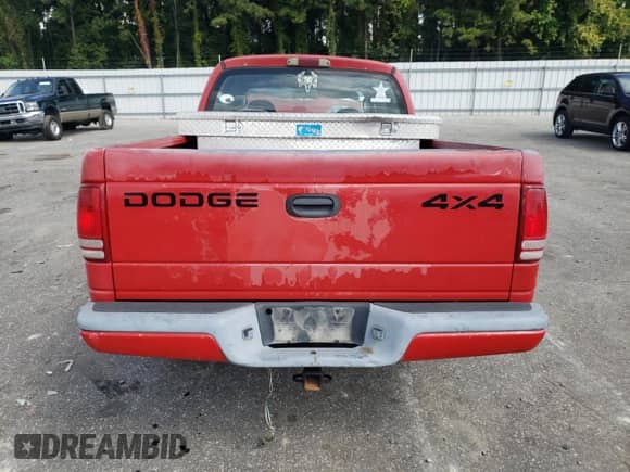 2002 Dodge Dakota Sport z VIN 1B7HG38N42S562989, wystawiony jako Copart lot #73033534 z przebiegiem 183 962 mil mil oraz Szkoda całkowita • Salvage title. Historia ofert i sprzedaży dostępna na DreamBid. Obrazek 6.