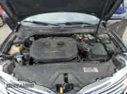 ✅ 2013 Lincoln MKZ • VIN: 3LN6L2J92DR816414 • Lot: 70139665. Wystawiony na Copart z przebiegiem 156 761 mil. Bezpłatny archiwum sprzedaży aukcyjnych z USA i szczegółowy raport historii pojazdu na DreamBid. Zdjęcie 11.