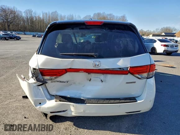 ✅ 2015 Honda Odyssey Touring Elite • VIN: 5FNRL5H91FB063309 • Lot: 94290475. Listed on Copart with 146,862 mi. Free auction sales archive from the USA and detailed vehicle history report at DreamBid. Image 6.