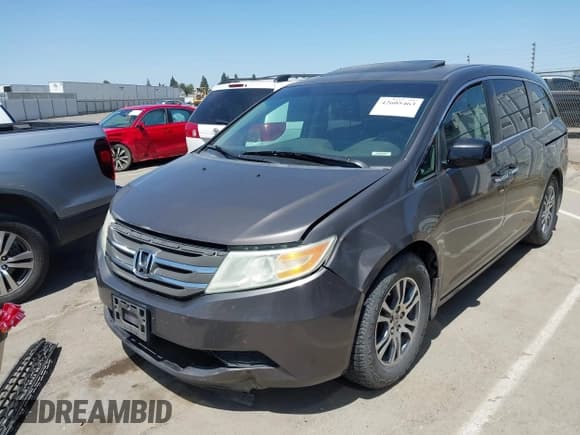 ✅ 2012 Honda Odyssey EX-L • VIN: 5FNRL5H63CB036727 • Lot: 42605463. Listed on IAAI with 179,407 mi. Free auction sales archive from the USA and detailed vehicle history report at DreamBid. Image 2.