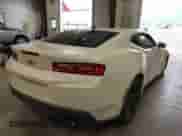 2016 Chevrolet Camaro 1LT z VIN 1G1FA1RX4G0172015, wystawiony jako IAAI lot #43063287 z przebiegiem 100 160 mil mil oraz . Historia ofert i sprzedaży dostępna na DreamBid. Obrazek 4.