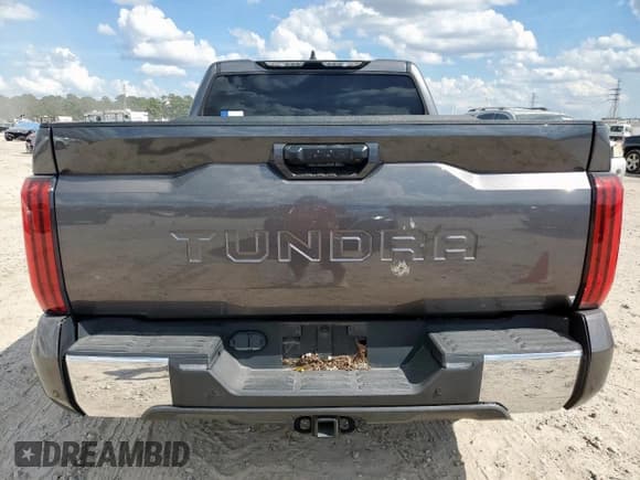 ✅ 2022 Toyota Tundra SR5 • VIN: 5TFLA5AB4NX013887 • Лот: 84706575. Опубликован ранее на Copart с пробегом 30 470 миль. Бесплатный доступ к архиву аукционных продаж из США и подробный отчёт об истории автомобиля на DreamBid. Изображение 6.
