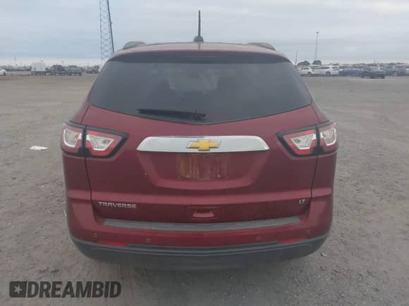 2017 Chevrolet Traverse LT z VIN 1GNKRGKD2HJ205761, wystawiony jako IAAI lot #43362483 z przebiegiem 89 450 mil mil oraz . Historia ofert i sprzedaży dostępna na DreamBid. Obrazek 16.