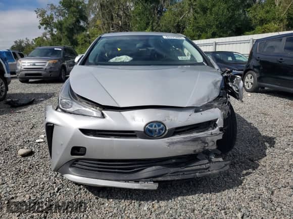 2021 Toyota Prius L Eco with VIN JTDKAMFU0M3141002, listed as a Copart auction lot 84425805 with 73,095 mi miles and Clean title. Bid and sale history available at DreamBid. Image 5.