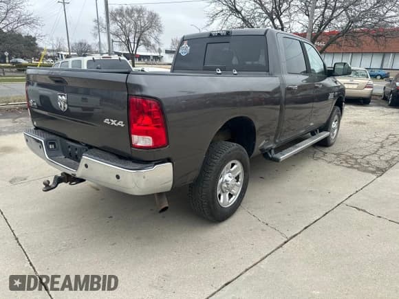 ✅ 2014 Ram 2500 Outdoorsman • VIN: 3C6UR5DJXEG258964 • Lot: 53026325. Listed on Copart with 242,209 mi. Free auction sales archive from the USA and detailed vehicle history report at DreamBid. Image 4.