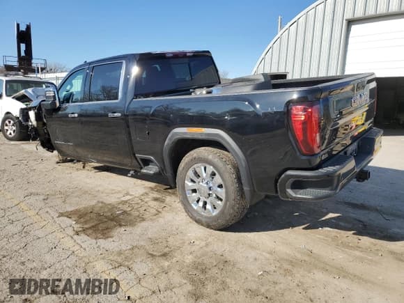 ✅ 2023 GMC Sierra 3500HD Denali • VIN: 1GT49WEY2PF169520 • Lot: 83541994. Listed on Copart with 33,940 mi. Free auction sales archive from the USA and detailed vehicle history report at DreamBid. Image 2.