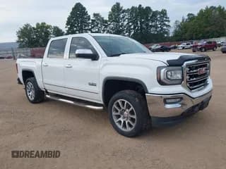 ✅ 2016 GMC Sierra 1500 SLT • VIN: 3GTU2NEC3GG323184 • Lot: 43138901. Listed on IAAI with 122,488 mi. Free auction sales archive from the USA and detailed vehicle history report at DreamBid. Image 1.