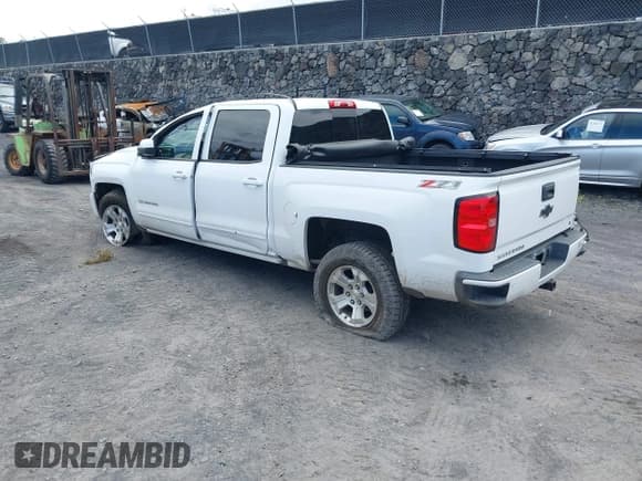✅ 2017 Chevrolet Silverado 1500 LT • VIN: 3GCUKREH0HG231812 • Lot: 42499686. Listed on IAAI with 128,341 mi. Free auction sales archive from the USA and detailed vehicle history report at DreamBid. Image 3.