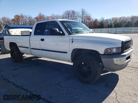 1999 Dodge 1500 с VIN 3B7HF13Z7XG136326, выставлен на аукционе Copart как лот 80277284 с пробегом Не указан миль и Списание • Salvage title. История ставок и продаж доступна на DreamBid. Изображение 4.