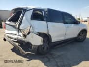 ✅ 2021 Honda Passport EX-L • VIN: 5FNYF7H52MB008411 • Lot: 70598655. Listed on Copart with 94,422 mi. Free auction sales archive from the USA and detailed vehicle history report at DreamBid. Image 3.