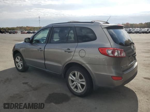 ✅ 2012 Hyundai Santa Fe SE • VIN: 5XYZHDAGXCG098035 • Lot: 75952204. Listed on Copart with 175,381 mi. Free auction sales archive from the USA and detailed vehicle history report at DreamBid. Image 2.