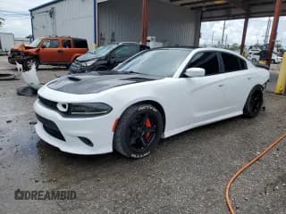 ✅ 2018 Dodge Charger R/T Scat Pack • VIN: 2C3CDXGJ4JH129563 • Lot: 69248895. Listed on Copart with 95,148 mi. Free auction sales archive from the USA and detailed vehicle history report at DreamBid. Image 1.