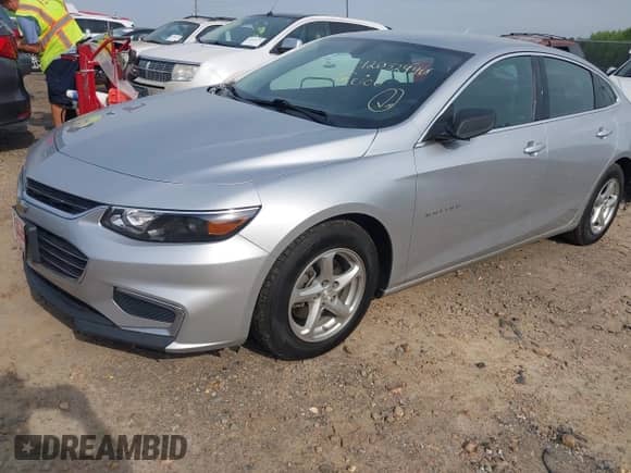 2018 Chevrolet Malibu LS z VIN 1G1ZB5ST6JF182056, wystawiony jako IAAI lot #42032940 z przebiegiem 151 613 mil mil oraz . Historia ofert i sprzedaży dostępna na DreamBid. Obrazek 18.