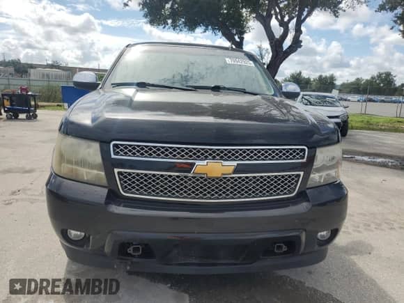 2013 Chevrolet Tahoe LTZ z VIN 1GNSKCE03DR228841, wystawiony jako Copart lot #70942925 z przebiegiem 142 667 mil mil oraz Szkoda całkowita • Salvage title. Historia ofert i sprzedaży dostępna na DreamBid. Obrazek 5.
