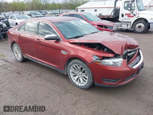 ✅ 2014 Ford Taurus Limited • VIN: 1FAHP2F80EG172007 • Lot: 42102543. Listed on IAAI with 143,798 mi. Free auction sales archive from the USA and detailed vehicle history report at DreamBid. Image 1.