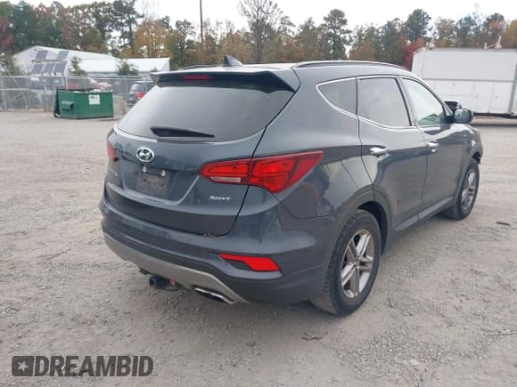✅ 2017 Hyundai Santa Fe 2.4L • VIN: 5NMZU3LB6HH027984 • Lot: 43505016. Listed on IAAI with 138,308 mi. Free auction sales archive from the USA and detailed vehicle history report at DreamBid. Image 4.