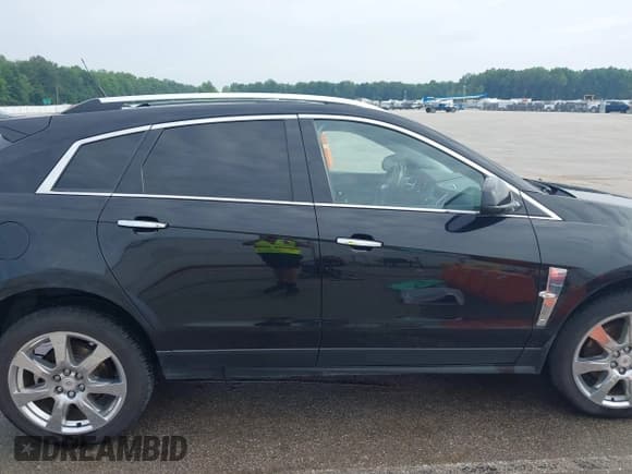 ✅ 2010 Cadillac SRX Performance Collection • VIN: 3GYFNEEY4AS658920 • Lot: 42497175. Wystawiony na IAAI z przebiegiem 166 325 mil. Bezpłatny archiwum sprzedaży aukcyjnych z USA i szczegółowy raport historii pojazdu na DreamBid. Zdjęcie 13.