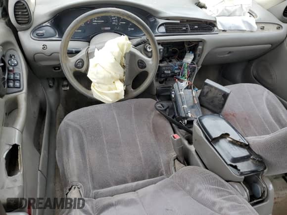 2003 Chevrolet Malibu z VIN 1G1ND52J13M657859, wystawiony jako Copart lot #42001955 z przebiegiem Nie podano mil oraz Szkoda całkowita • Salvage title. Historia ofert i sprzedaży dostępna na DreamBid. Obrazek 8.