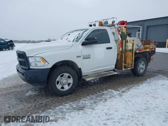 ✅ 2014 Ram 2500 • VIN: 3C7WR5AJ3EG225104 • Lot: 41397520. Wystawiony na IAAI z przebiegiem 128 477 mil. Bezpłatny archiwum sprzedaży aukcyjnych z USA i szczegółowy raport historii pojazdu na DreamBid. Zdjęcie 2.