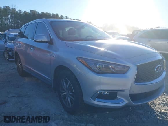 ✅ 2020 Infiniti QX60 Luxe • VIN: 5N1DL0MN2LC546831 • Lot: 41232325. Listed on IAAI with 49,858 mi. Free auction sales archive from the USA and detailed vehicle history report at DreamBid. Image 1.