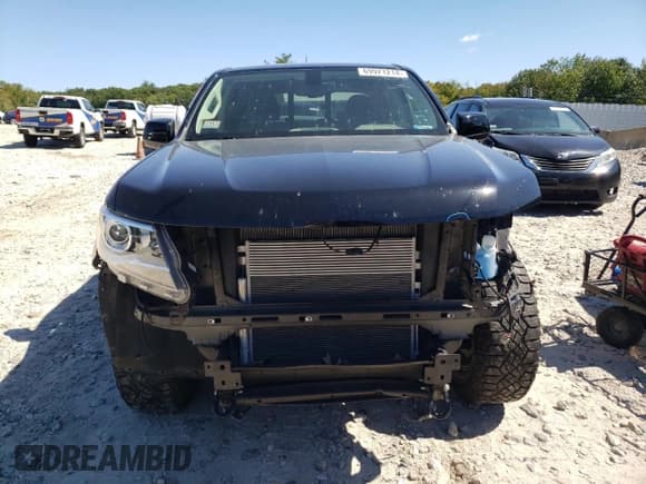 ✅ 2018 Chevrolet Colorado 4WD Z71 • VIN: 1GCGTDENXJ1277056 • Лот: 69921214. Опубликован ранее на Copart с пробегом 47 600 миль. Бесплатный доступ к архиву аукционных продаж из США и подробный отчёт об истории автомобиля на DreamBid. Изображение 5.
