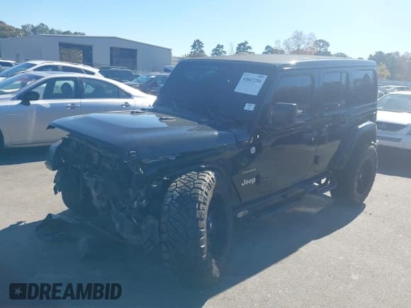 ✅ 2019 Jeep Wrangler Unlimited Sahara • VIN: 1C4HJXEG1KW572693 • Lot: 43697259. Listed on IAAI with 42,087 mi. Free auction sales archive from the USA and detailed vehicle history report at DreamBid. Image 2.