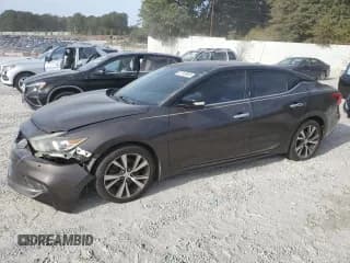 ✅ 2016 Nissan Maxima Platinum • VIN: 1N4AA6AP5GC441993 • Lot: 82742805. Wystawiony na Copart z przebiegiem 189 336 mil. Bezpłatny archiwum sprzedaży aukcyjnych z USA i szczegółowy raport historii pojazdu na DreamBid. Zdjęcie 1.