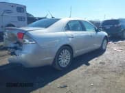 ✅ 2010 Mercury Milan Hybrid • VIN: 3MEDM0L37AR645773 • Lot: 41692785. Listed on IAAI with 99,510 mi. Free auction sales archive from the USA and detailed vehicle history report at DreamBid. Image 4.