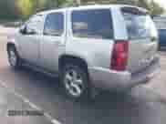 2011 Chevrolet Tahoe LTZ with VIN 1GNSKCE01BR231833, listed as a IAAI auction lot 43053303 with 247,341 mi miles and . Bid and sale history available at DreamBid. Image 3.