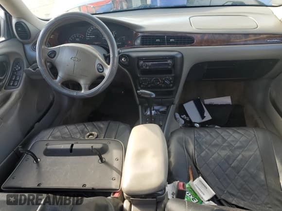 ✅ 2003 Chevrolet Malibu LS • VIN: 1G1NE52J83M673974 • Lot: 82691405. Listed on Copart with 226,857 mi. Free auction sales archive from the USA and detailed vehicle history report at DreamBid. Image 8.