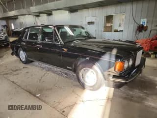 ✅ 1993 Bentley Brooklands • VIN: SCBZE02D5PCX46397 • Lot: 80643295. Wystawiony na Copart z przebiegiem 46 655 mil. Bezpłatny archiwum sprzedaży aukcyjnych z USA i szczegółowy raport historii pojazdu na DreamBid. Zdjęcie 4.