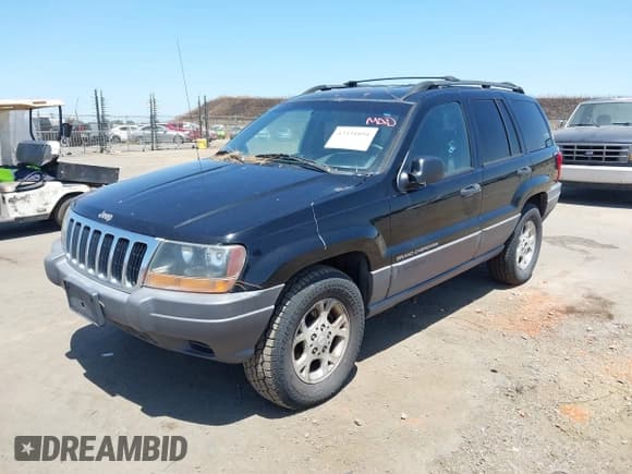 ✅ 2001 Jeep Grand Cherokee Laredo • VIN: 1J4GW48S31C579926 • Lot: 42331094. Listed on IAAI with Not provided. Free auction sales archive from the USA and detailed vehicle history report at DreamBid. Image 2.