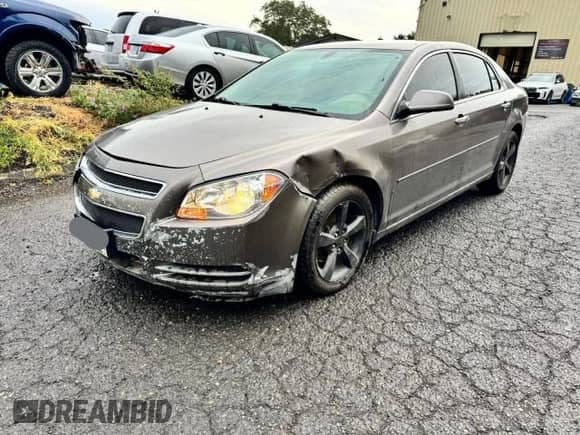 2012 Chevrolet Malibu 1LT z VIN 1G1ZC5E01CF208760, wystawiony jako Copart lot #91533105 z przebiegiem 147 278 mil mil oraz Czysty tytuł • Clean title. Historia ofert i sprzedaży dostępna na DreamBid. Obrazek 2.