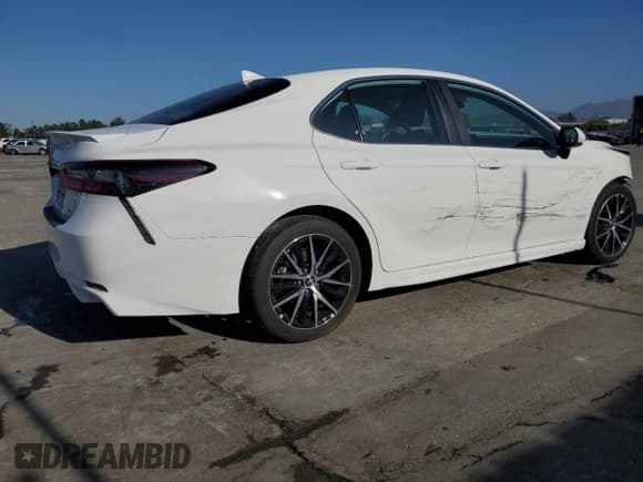 ✅ 2024 Toyota Camry Hybrid SE • VIN: 4T1G31AK0RU076475 • Lot: 82749245. Wystawiony na Copart z przebiegiem 10 497 mil. Bezpłatny archiwum sprzedaży aukcyjnych z USA i szczegółowy raport historii pojazdu na DreamBid. Zdjęcie 3.