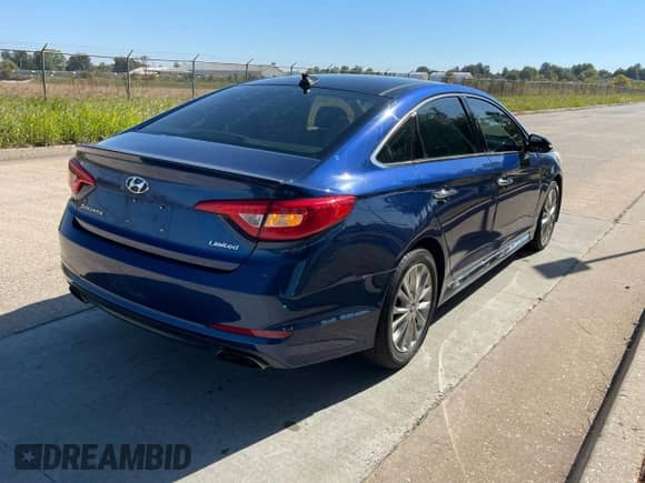 2015 Hyundai Sonata Sport with VIN 5NPE34AFXFH129575, listed as a Copart auction lot 91865415 with 137,348 mi miles and Clean title. Bid and sale history available at DreamBid. Image 4.