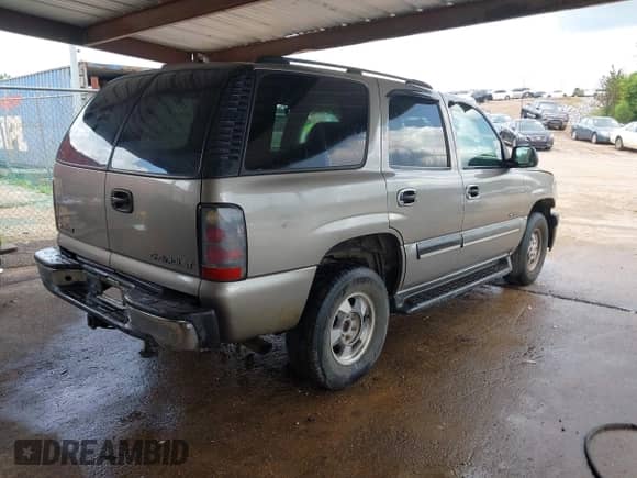 2001 Chevrolet Tahoe LT z VIN 1GNEK13T51J186505, wystawiony jako IAAI lot #42648332 z przebiegiem 282 884 mil mil oraz . Historia ofert i sprzedaży dostępna na DreamBid. Obrazek 4.
